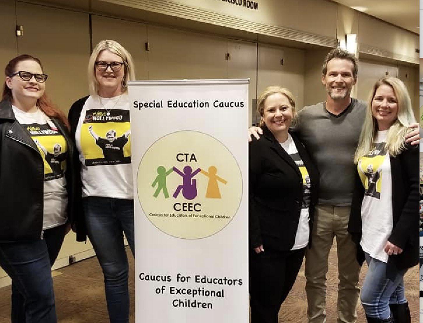 5 people, members of the CEEC caucus standing next to a sign smiling