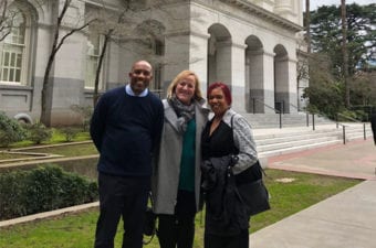 People standing outside the State Capital Building