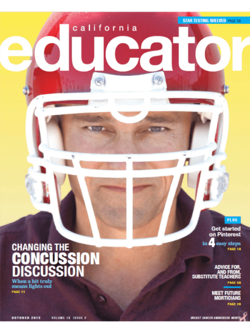 Man in football helmet standing up