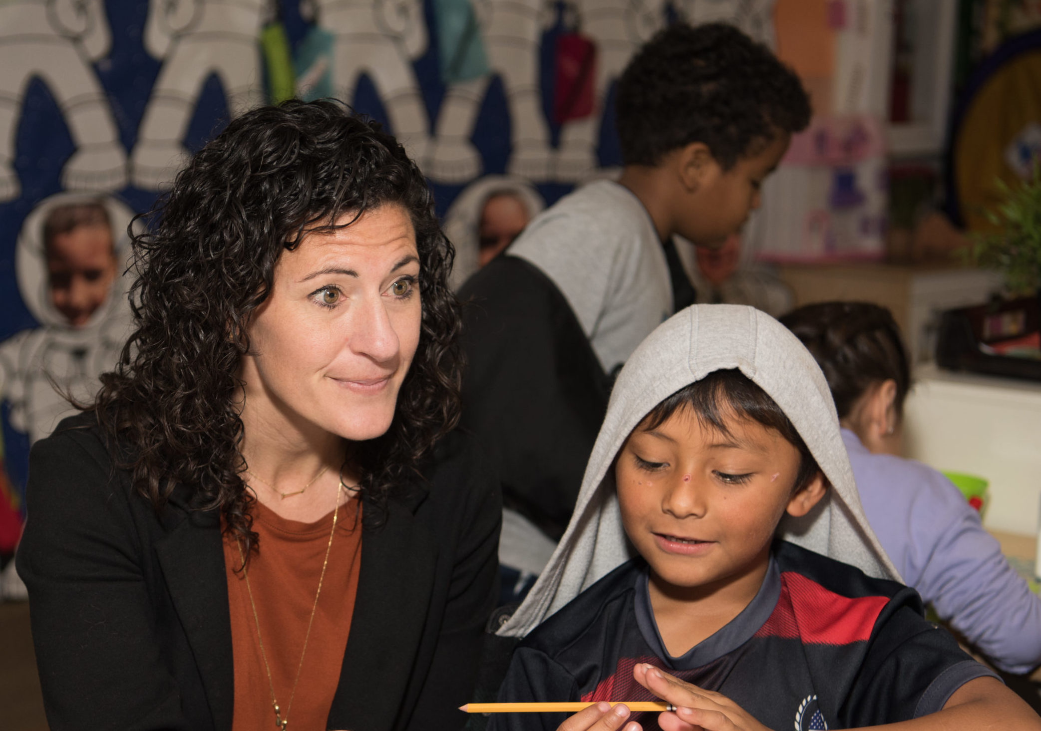 Kathleen Loyd with a student