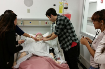 students learning CPR