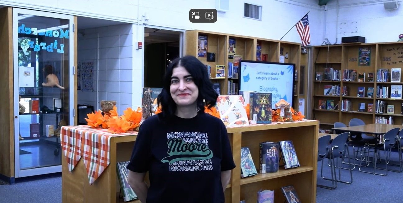 Member Jenann Elias in the current school library, which she said has not been updated in over 40 years. Right: Overview of the new space. 
