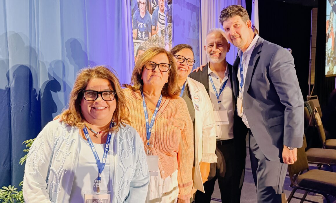 Liz Huerta-Brewster, honored at CTA State Council in April, is second from left. Left to right: CTA Vice President Leslie Littman, CTA Secretary-Treasurer Erika Jones, CTA Executive Director Jeff Good, CTA President David Goldberg.