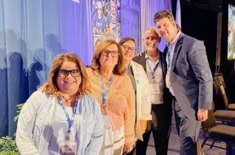 Liz Huerta-Brewster, honored at CTA State Council in April, is second from left. Left to right: CTA Vice President Leslie Littman, CTA Secretary-Treasurer Erika Jones, CTA Executive Director Jeff Good, CTA President David Goldberg.