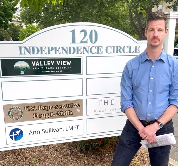 Chico Unified Teachers Assn. President Charlie Snyder stands outside of Rep. Doug LaMalfa’s office; LaMalfa refused to meet with Snyder and others in the CTA delegation.