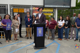 Photo of David Golderberg discussing Learning Policy Institute's findings on effectiveness of community schools