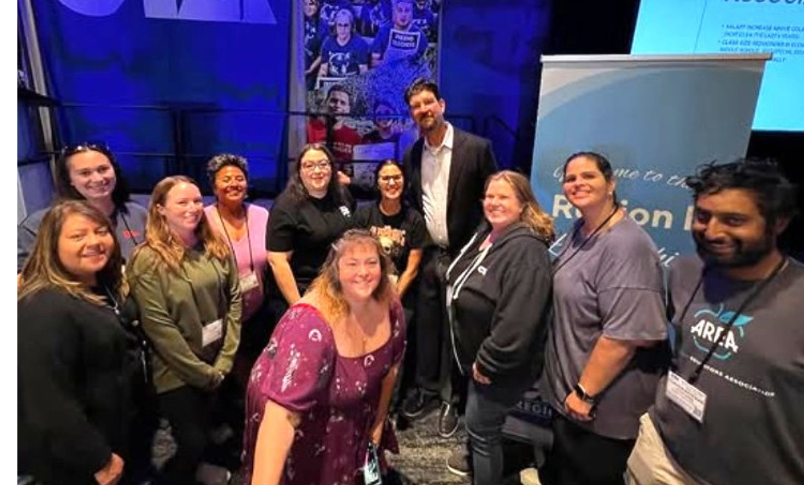 AREA members pictured at a CTA leadership conference with CTA President David Goldberg earlier this year.