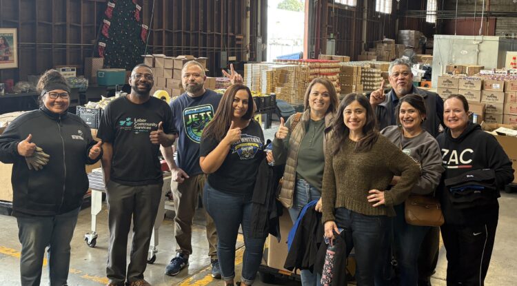 Community Schools teams in Whittier packing up boxes of food to get ready for food distributions.