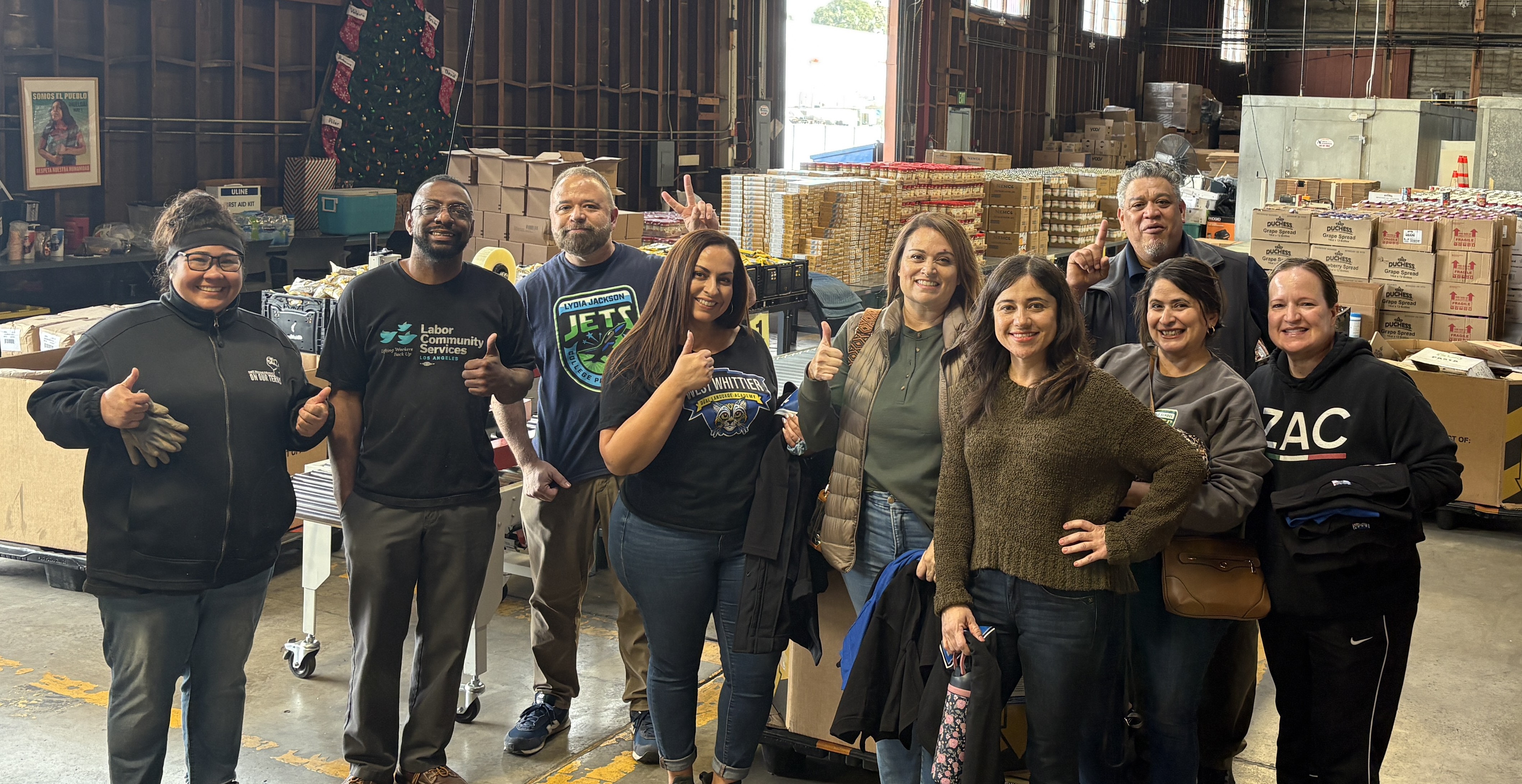 Community Schools teams in Whittier packing up boxes of food to get ready for food distributions.