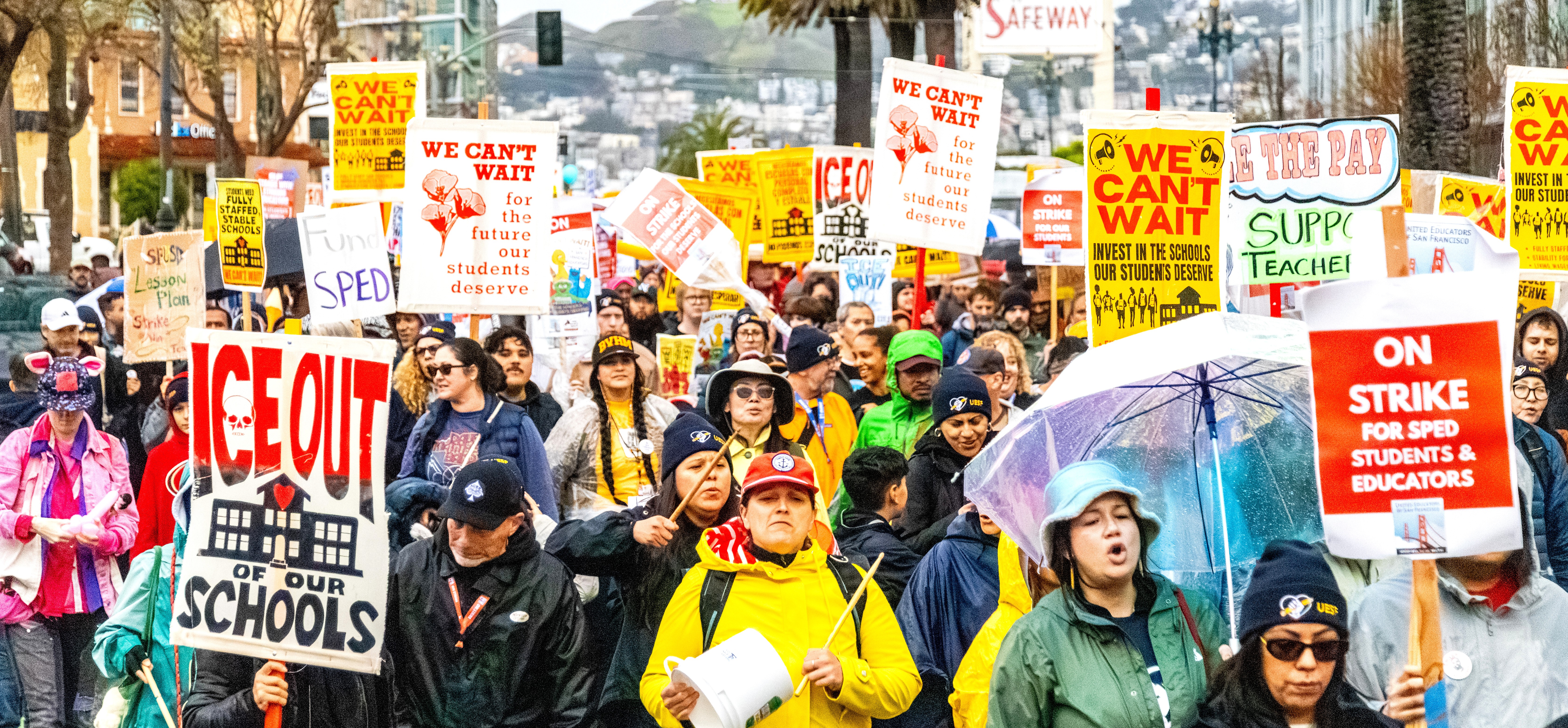 Photos this page: Neither rain nor a recalcitrant school district stifled UESF members’ voices.