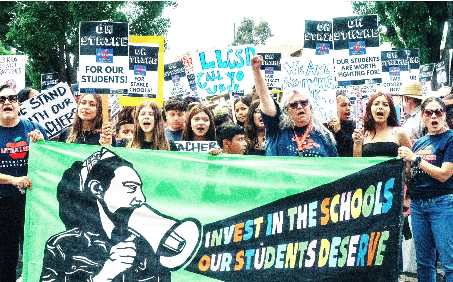 LLEA President Maria Pilios (fist raised) led the local andits many supporters in a successful strike in April.