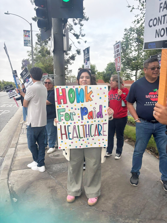 LLEA members, as well as parents and community, called for improved health care benefits.