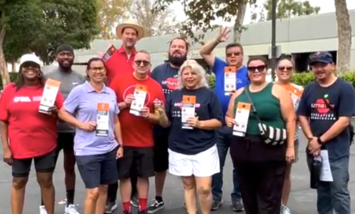 CTA President David Goldberg (fourth from left) and CTA Board Member Ken Tang (fourth from right) along with Little Lake Education Assn. members canvassing in September.