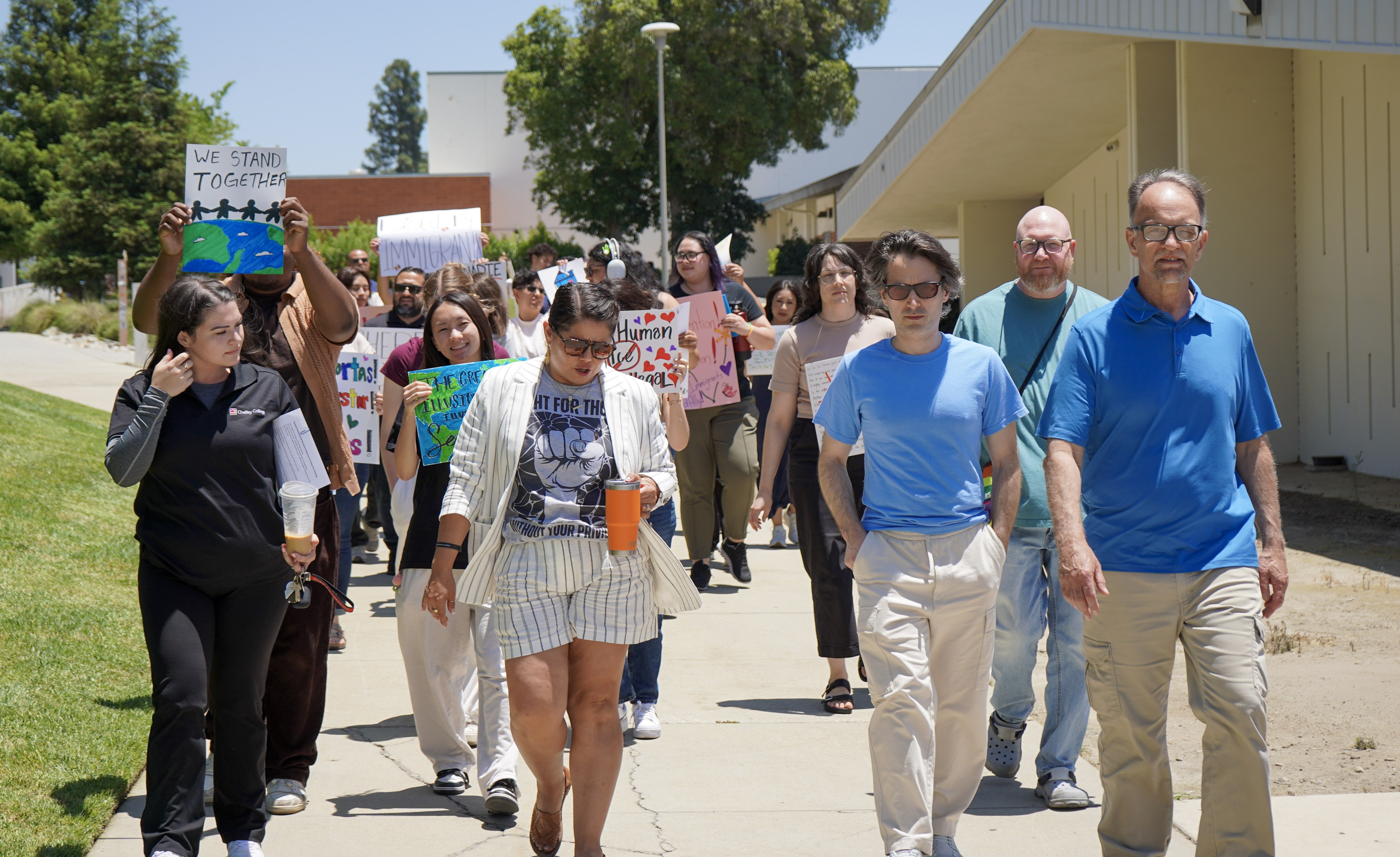 CCFA President David Rentz, third from right, marches with members, classified colleagues and students.