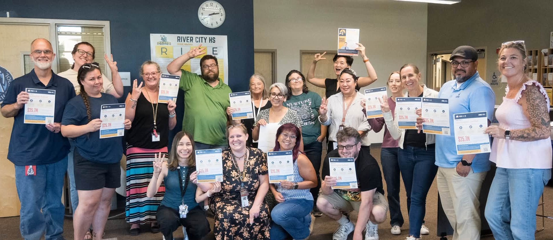 West Sacramento Teachers Association members with flyers that let colleagues and community know that Washington Unified — theirschool district — will lose $25.7 million each year, making Prop. 3 a must-win this November.